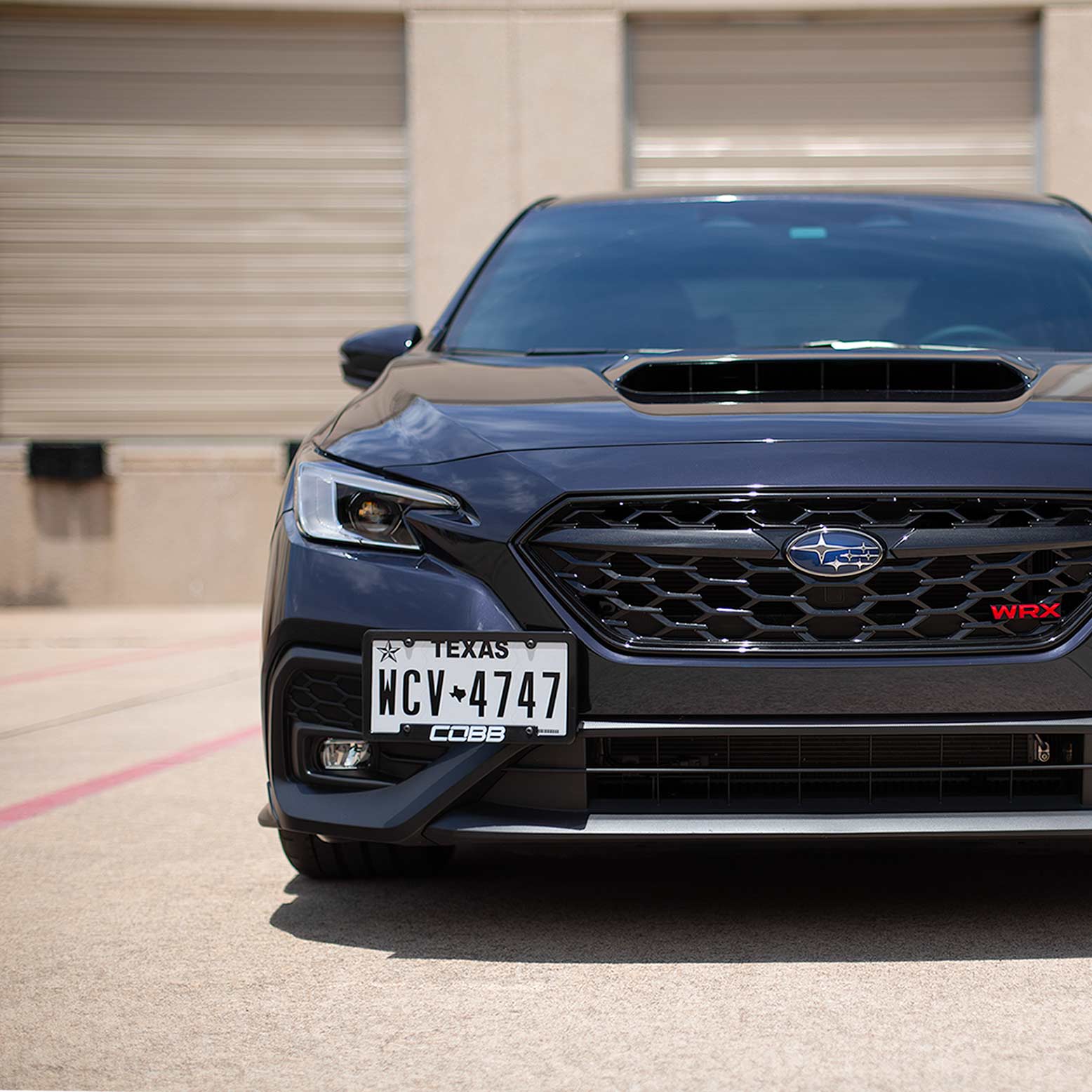COBB Redline Carbon Fiber License Plate Relocation Mount - 15-21 Subaru WRX/STI, 2022+ WRX, 13-21 BRZ, 2022+ BRZ