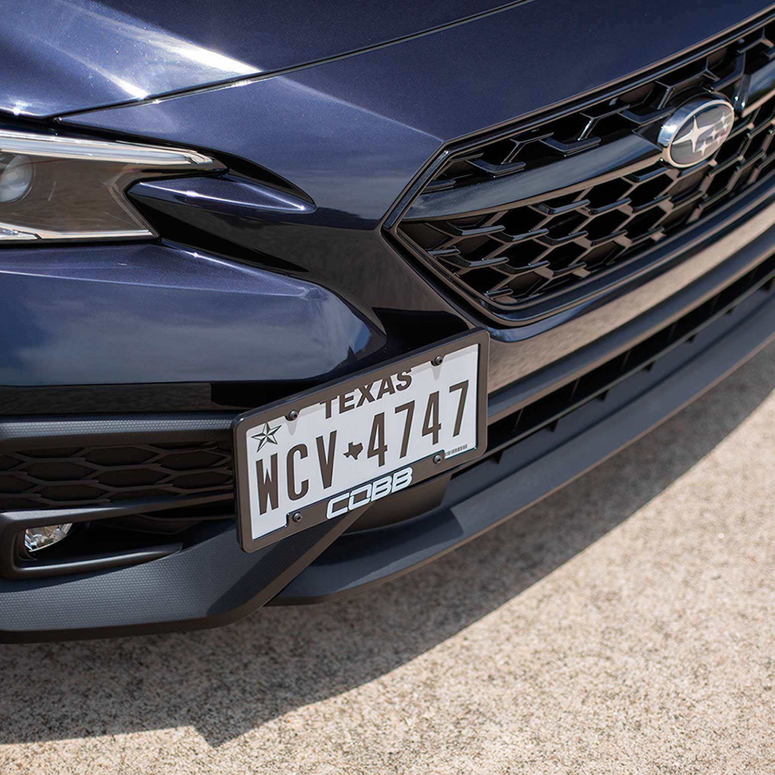 COBB Redline Carbon Fiber License Plate Relocation Mount - 15-21 Subaru WRX/STI, 2022+ WRX, 13-21 BRZ, 2022+ BRZ