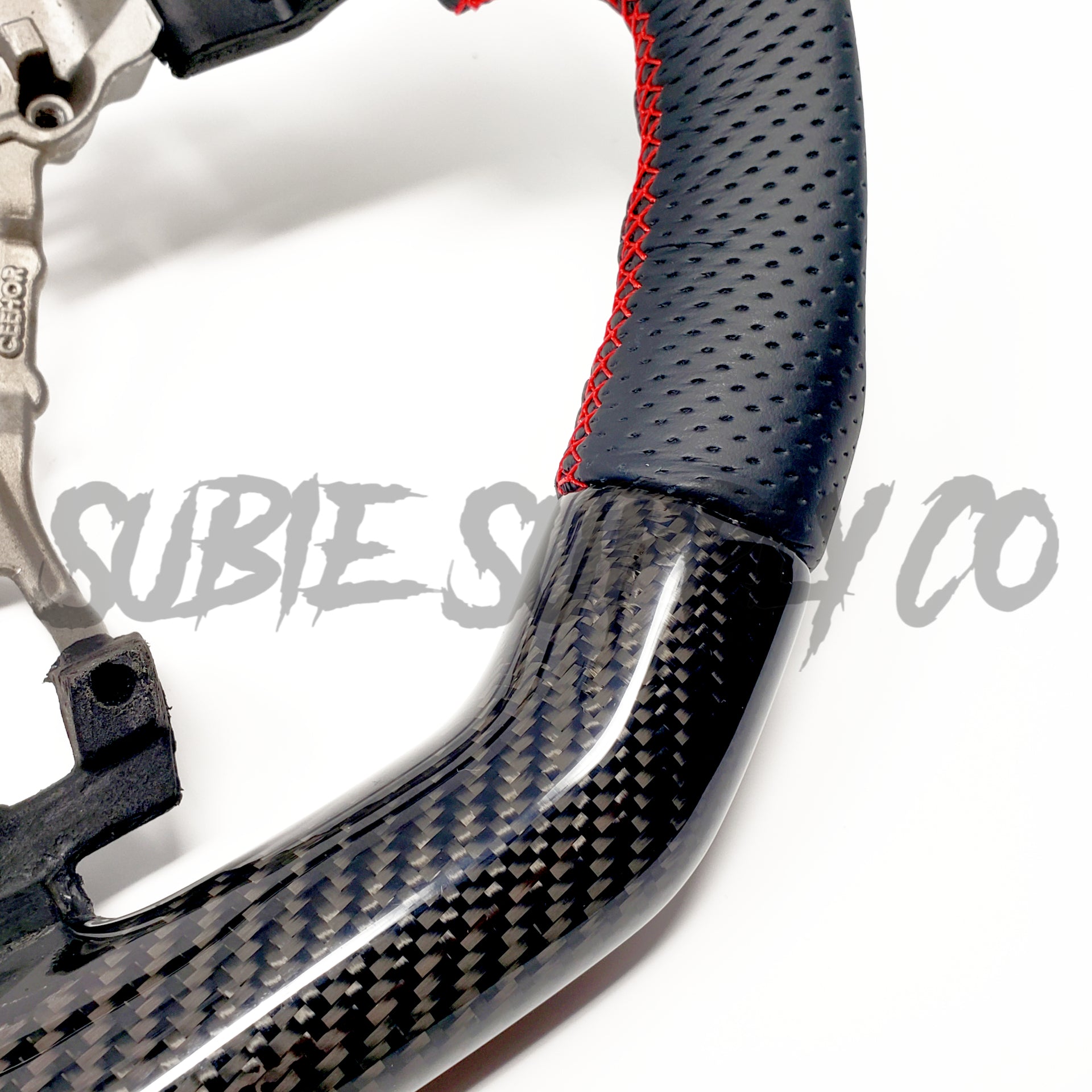 SSC BLACK LEATHER/CARBON FIBER STEERING WHEEL WITH RED STITCHING - 2015-2021 WRX/STI