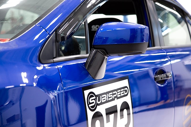 OLM LE DRY CARBON FIBER LOWER MIRROR MOUNT COVER - 2015-2021 WRX, 2015-2021 STI, 2015-2017 Crosstrek, 2015-2016 Impreza