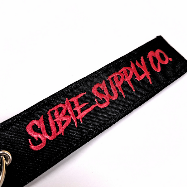 SUBIE SUPPLY CO JET TAG - RED