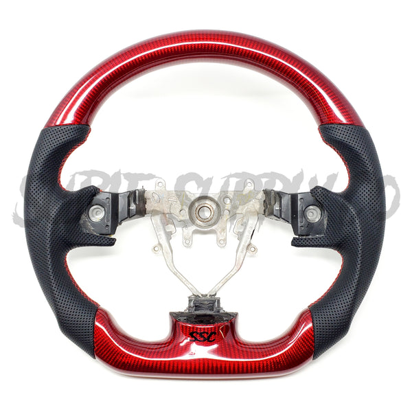 SSC V2 BLACK LEATHER/RED CARBON FIBER STEERING WHEEL WITH RED STITCHING- 08-14 IMPREZA WRX/STI, 08-09 LEGACY/OUTBACK, 09-13 FORESTER